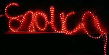 Red light up sign reading 'erotica'